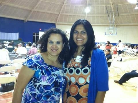 Two alumnae in the gym at the reunion.