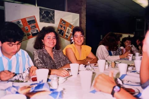 Students at a banquet table in the mid-1980s.