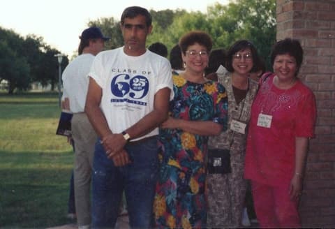 Alumni at a reunion around 1994, one in a Class of 1969 T-shirt; Yvonne Dagmar de Lugo is second from left.