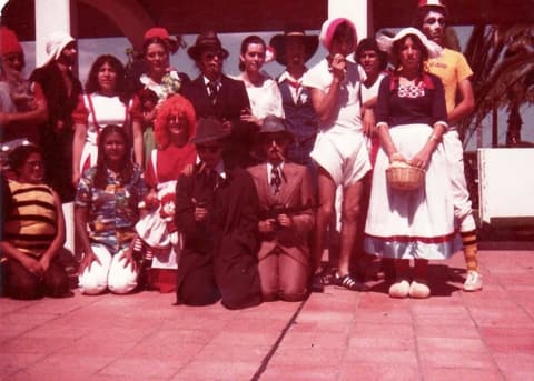 The Class of 1980 in costume — clowns, Dutch girls and gangsters — for a dress-up party.