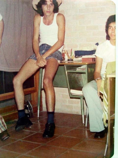 Cut-offs and a cowboy hat in the dorm.