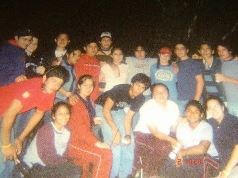 The Class of 2005 at night on its senior wildlife retreat.