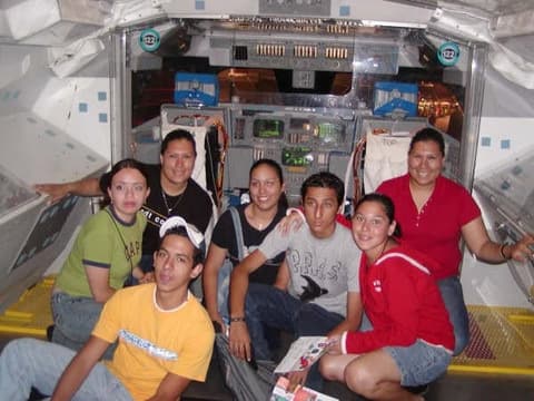 Students inside the Space Shuttle mock-up on a trip to Space Center Houston.
