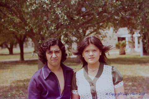 Two friends under the trees on campus in 1975, from a set with Alice, Maria, Mitzi Alexander and Lupe Flores.