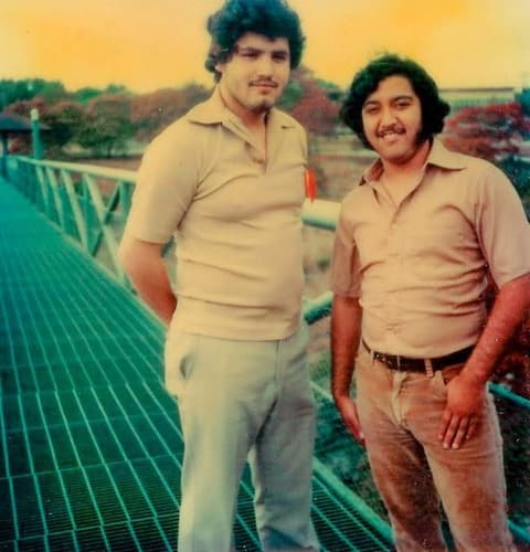 Lupe Flores and Sammy Garcia on the bridge at Mo-Ranch, about 1978–79.