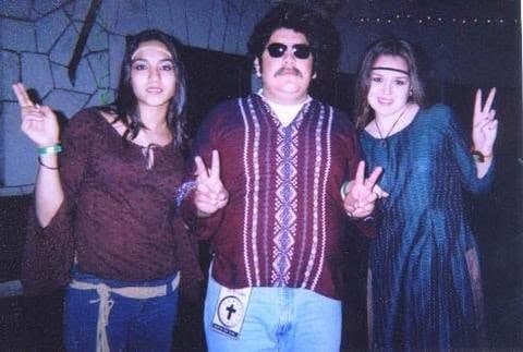 Dressed as hippies for a costume night, which the poster thinks was at Mo-Ranch, the Presbyterian camp.
