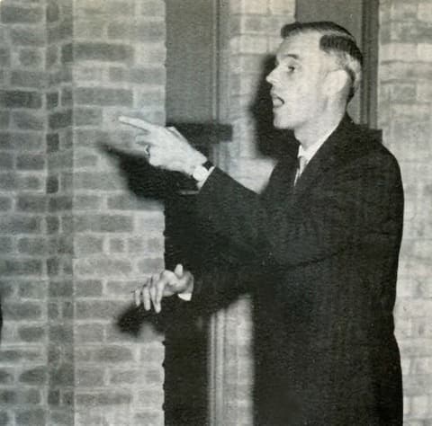 Robert C. Scott directing the choir, from the 1965 Juntos.