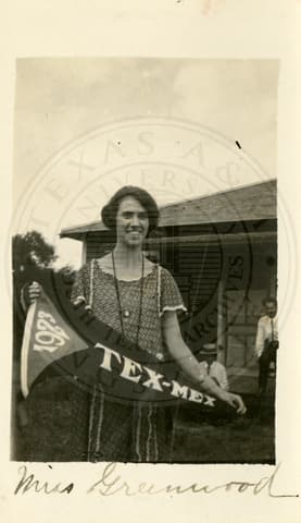 Mira Greenwood with the ‘Tex Mex 1923’ banner.
