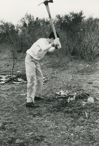 Student working in field.