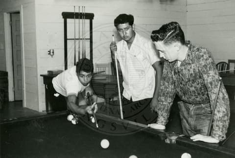 Students playing pool.