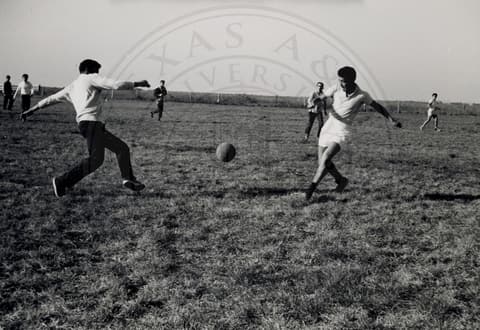 Students playing soccer.