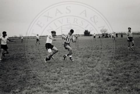Students playing soccer.