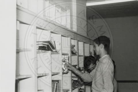 Student in library.