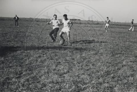 Students playing soccer.