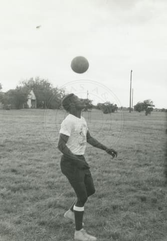 Students playing soccer.