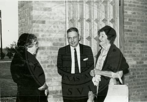 Man and two women.