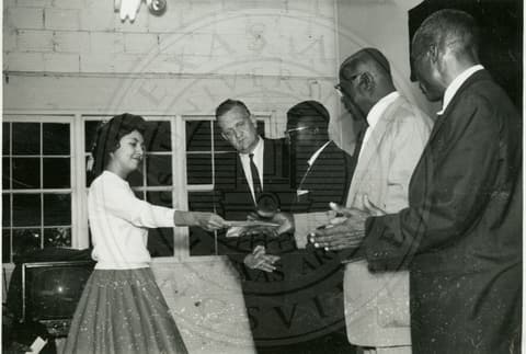 Student with professors.