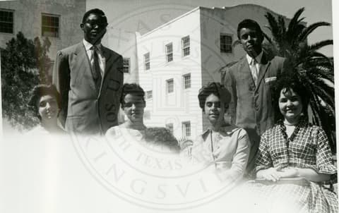 Student with professors.