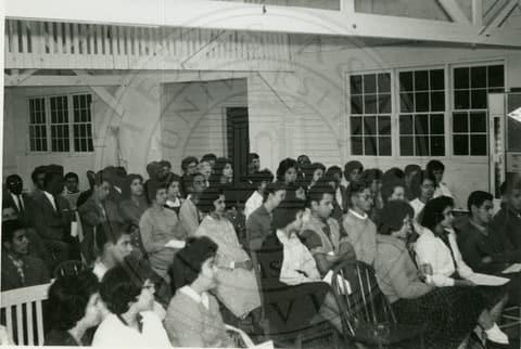 Students sitting down.