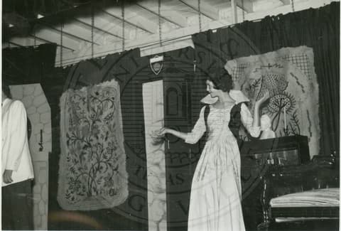 Girl in stage performing.