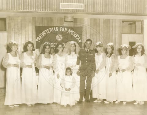Wedding of unknown couple with bridesmaids.
