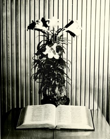 Flowers and a Bible.