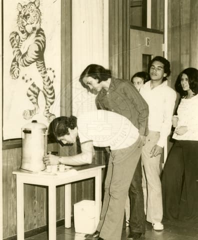 Students getting coffee.