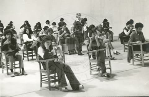 Teacher giving a class.