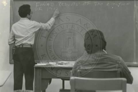 Teacher giving a class to student.